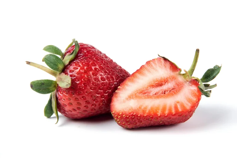 red fresh strawberries with green leaves Web H